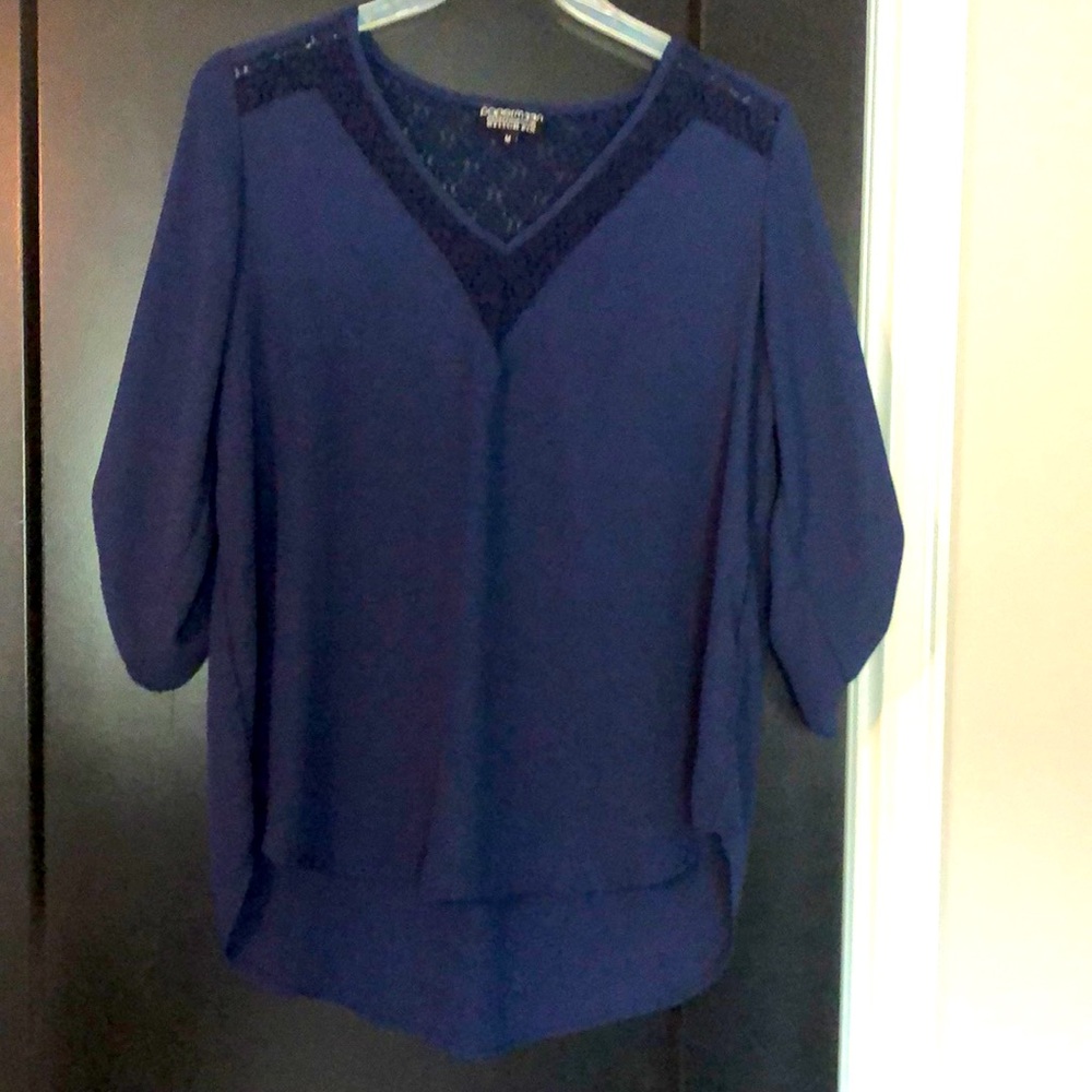 Navy lightweight blouse with lace accents.